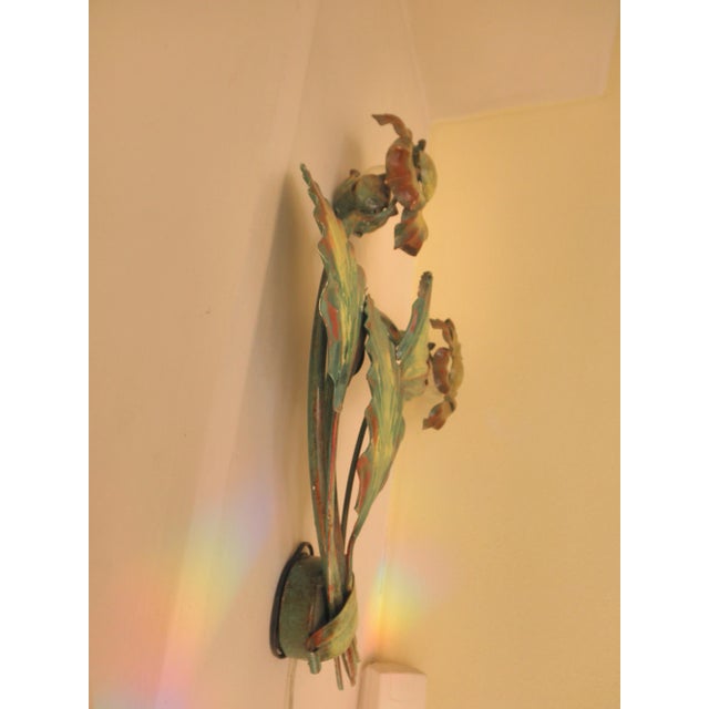 This 1980s hand-painted wall lamp was produced in Italy and has two lights. European Plug (up to 250V).The wiring of this...