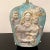 A beautiful and very early table lamp, with a classical figural imagery that features a mother and child along with...