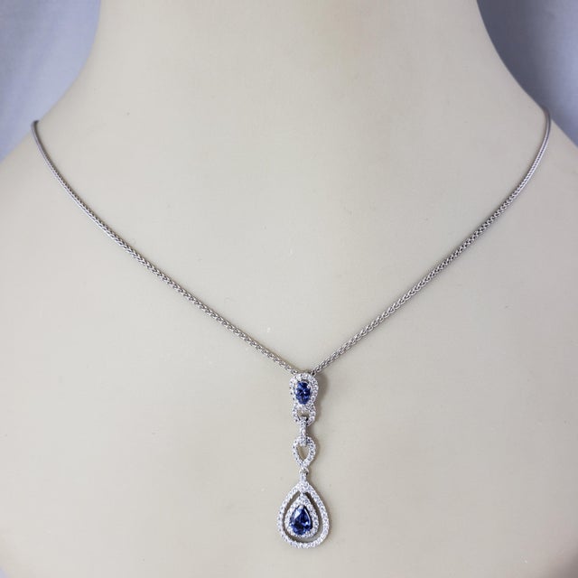 14K White Gold Sapphire and Diamond Pendant Necklace JAGi Certified- This stunning pendant necklace features two pearl cut...