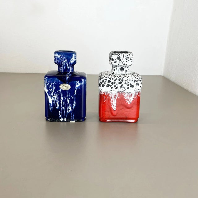 Set of two fat lava art vases Producer: Jopeko Ceramics, Germany Decade: 1970s These original vintage vases was produced...