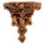 Monumental carved giltwood baroque wall bracket, with carved foliate scroll and putti motif. An unusually large wall bracket.