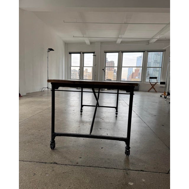 Timeless retired table expertly crafted from heavy cast iron and salvaged solid wood. Beautiful proportions and classic...