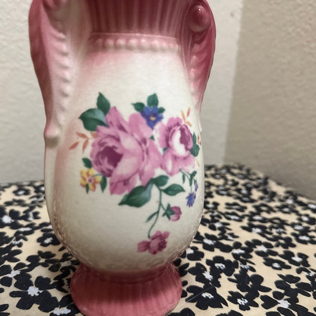 This stunning, antique Royal Copley floral vase adds a touch of classic beauty and timeless elegance to any home decor.