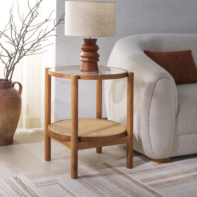 Enliven your home with the refreshing and airy design of our Karyna accent table. Our two-tiered accent table features a...