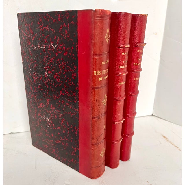 Set of 3 antique French red leather bound books. 1905 Le Livre des Mille Nuits et Une Nuit 1880 Oeuvres Completes de...
