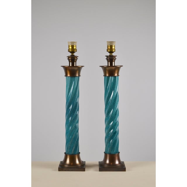 Striking neoclassical table lamp in glazed turquoise ceramic, featuring a sculptural twisted column shaft inspired by...