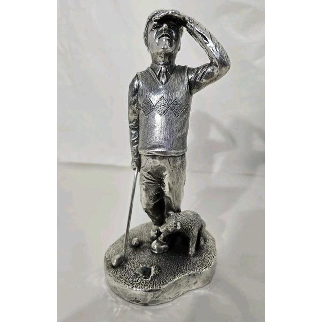 A charming vintage novelty sterling silver figurine dating to 1997, depicting a humorous golfing scene. The composition...