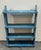 This original painted robin egg blue painted hanging wall shelf.