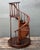 This masterfully crafted architectural model of a spiral staircase is an exceptional tribute to the tradition of...