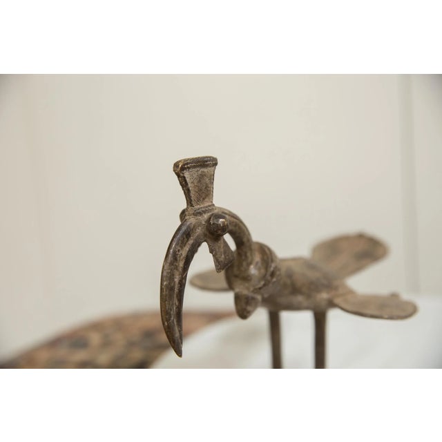 :: Vintage handmade African bronze bird. Circa mid 20th century and possibly older, each figure in this collection...
