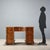 Umbertina open desk made of walnut, dating back to the late 19th century, featuring a shaped top with brown leather...