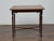 This elegant 19th-century English mahogany drop-leaf table offers both versatility and classic appeal. Crafted from rich...