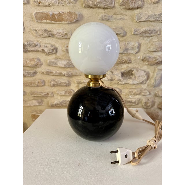 Jacques ADNET, Rare, Table lamp late 1940s early 1950s, the base in black opaline (full and heavy) topped with a white...