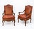 This is a pair of Hickory Chair / Pearson French Louis XIV style carved walnut and leather bergere chairs. Pearson Co. is...