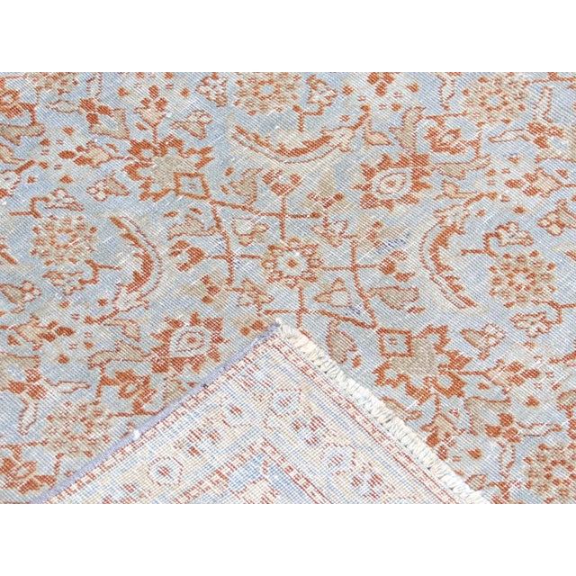 Crafted by expert weavers in the Persian city of Tabriz, this 5'3" x 8'7" rug exudes timeless elegance. Its semi-antique...