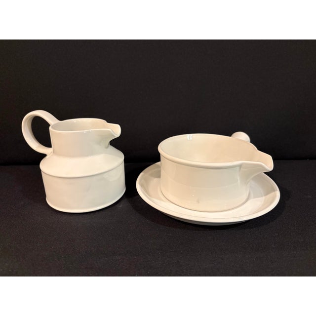 This set includes a gravy boat and saucer and creamer from the classic English white Stonehenge pattern designed by WR...
