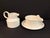 This set includes a gravy boat and saucer and creamer from the classic English white Stonehenge pattern designed by WR...