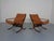 Living room set consisting of two Siesta armchairs in cognac-colored leather and a table. Table dimensions: Height 50 cm,...