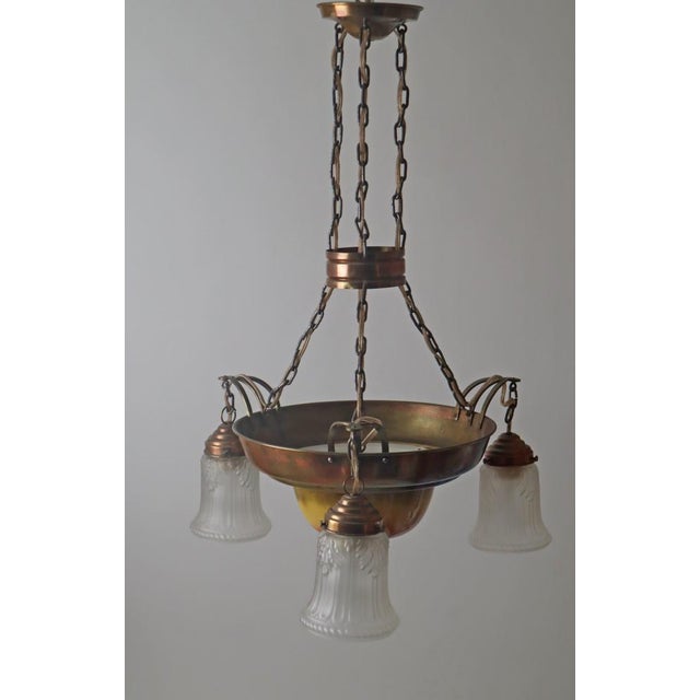 Danish Art Nouveau Chandelier in Brass, Copper and Ceramic, 1910s, in Good conditions. Designed 1890 to 1919 Up to 250V...