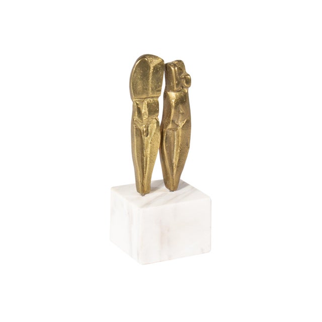 An abstract miniature brass sculpture by the American artist Ruth Kessler Vodicka (1921-1999). Two abstract figures stand...