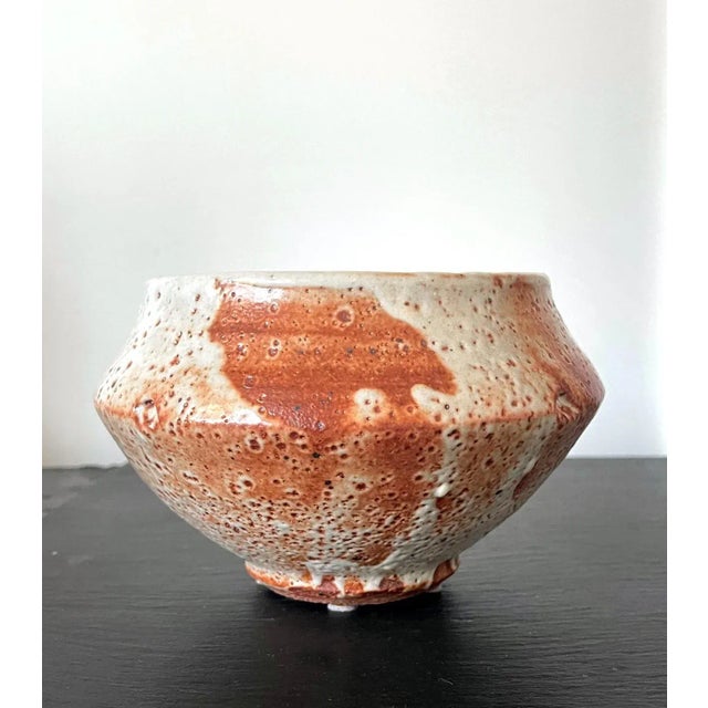 A studio made ceramic tea bowl (Chawan) with a slightly irregular form and exceptional surface glaze by American potter...