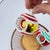 Glass 1990s Kurt Adler Style Colorful Reflector Striped Ornaments- Set of Three For Sale - Image 7 of 9