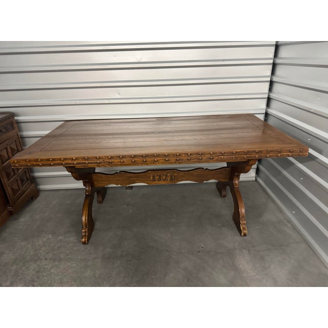 (attributed) Romweber has been a renowned American furniture maker since 1879, and this Nordic Inspired Viking Oak dining...