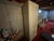 20th Century Ficks Reed Mirrored Back Glass Cabinet, solid doors, mirrored inside cabinet, lighting. One drawer behind the...