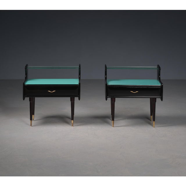 This sophisticated pair of Italian nightstands from the 1950s exemplifies the luxurious design principles of the mid-...