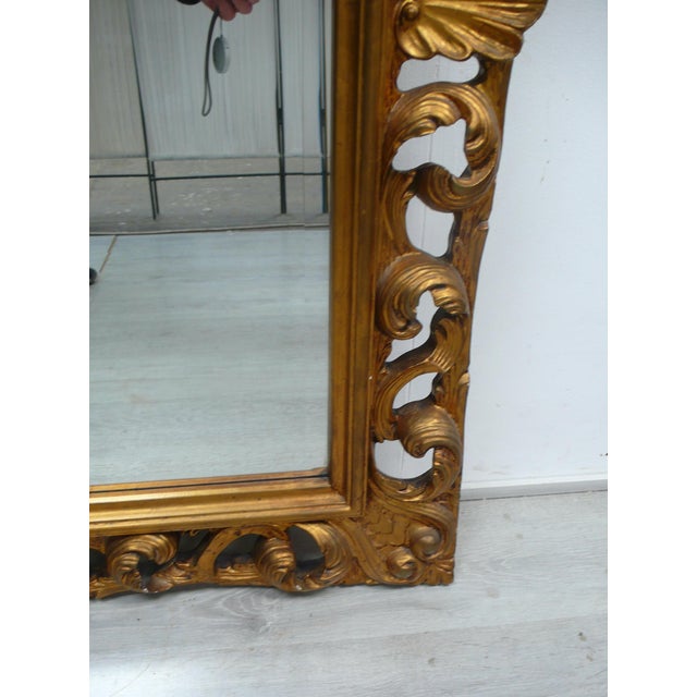 Very large antique wall mirror (as big as a front door!) with beveled mirror and carved baroque wooden frame, in gold...