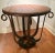 A handsome example after Raymond Subes - variegated and dynamic beveled marble top with well designed wrought iron base -...
