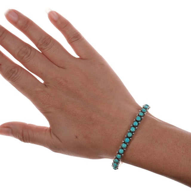 Silver 6.25" c1930's slim Navajo silver and turquoise row cuff bracelet. For Sale - Image 8 of 9