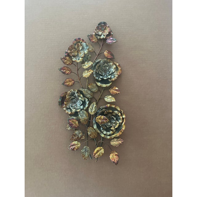 A stunning piece of vintage wall décor, this metal sculpture features intricately crafted roses and foliage in a mix of...