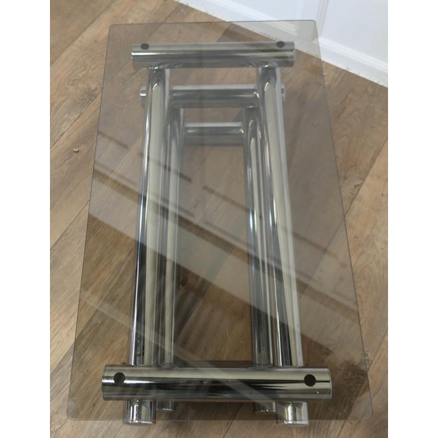 Mid-Century Italian Crome and Smoked Glass Coffee/Cocktail Table Constructivist style cocktail table in chrome with a...