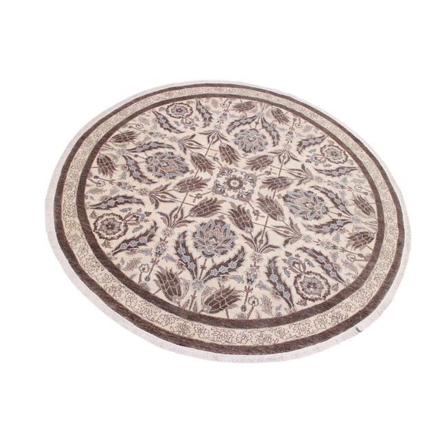 Transform your space with the Kafkaz Chobi Peshawar Round Hand?Knotted Wool Rug, crafted by skilled Turkish artisans using...