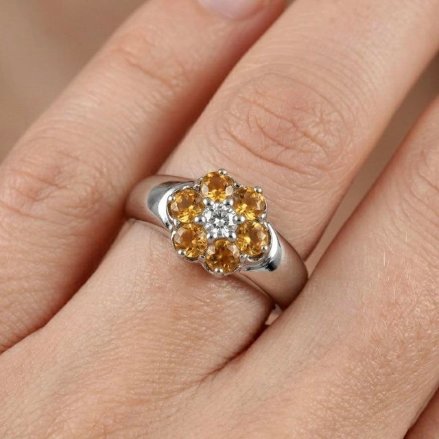 This bold and contemporary ring showcases a radiant Citrine gemstone, admired for its warm golden-yellow hue and vibrant...