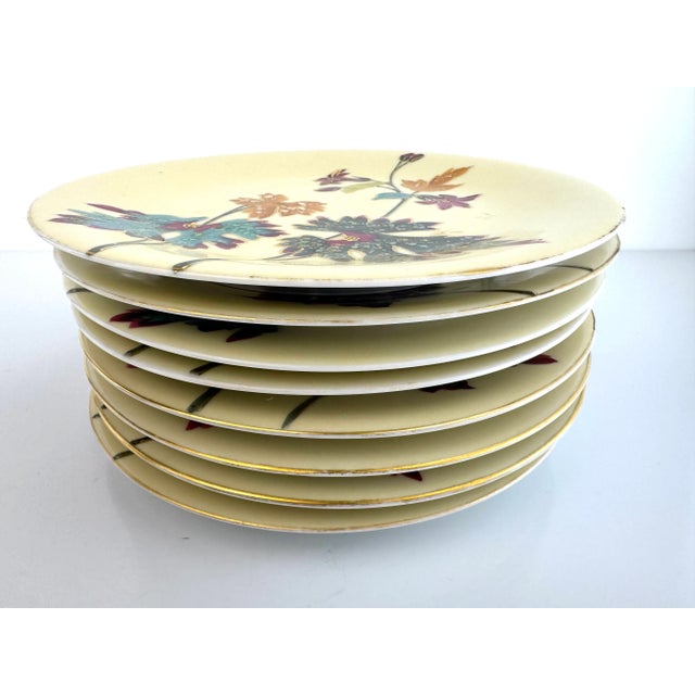 Vibrant and whimsical, this mid-century Japanese porcelain dessert set includes eight plates and a coordinating footed...