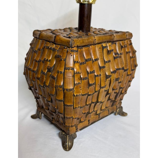 Vintage Asian Chinoiserie split bamboo table lamp with brass feet and bamboo finial. Great condition. 20.5” height to...
