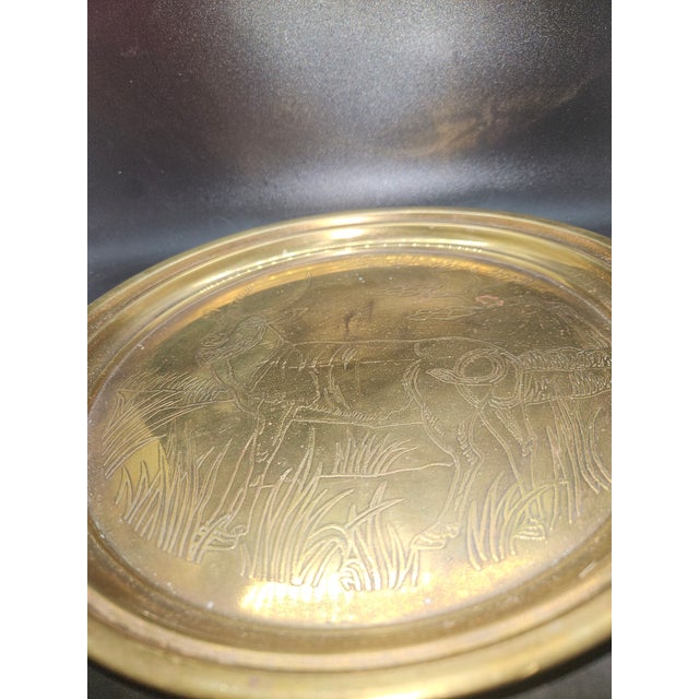 Vintage Decorative Brass Plate Features an Incised Nature Scene, Prominent Antelope