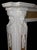 Late 20th century English Georgian style polychrome marble mantel having beautifully carved, forward and side facing...