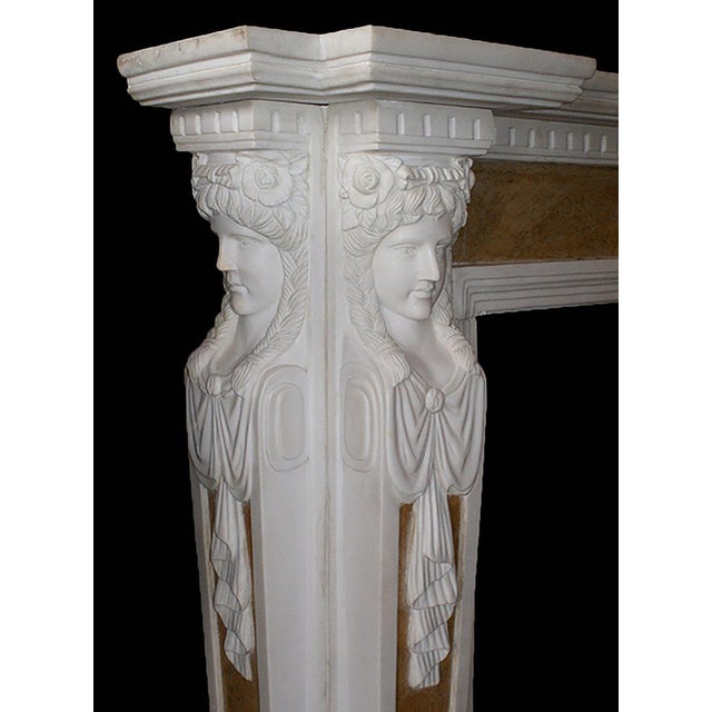Late 20th century English Georgian style polychrome marble mantel having beautifully carved, forward and side facing...