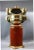 English yacht binnacle by Pascall Atkey of Cowes. Round, varnished mahogany base with brass feet. Hood is solid brass with...