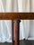 This vintage burl wood oval accent table features a richly figured burl veneer top framed by a contrasting wood border,...