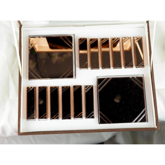 Rare set of knife rests, trivet and bottle coasters in lined molded glass with mirror background, rose gold tint, elegant...