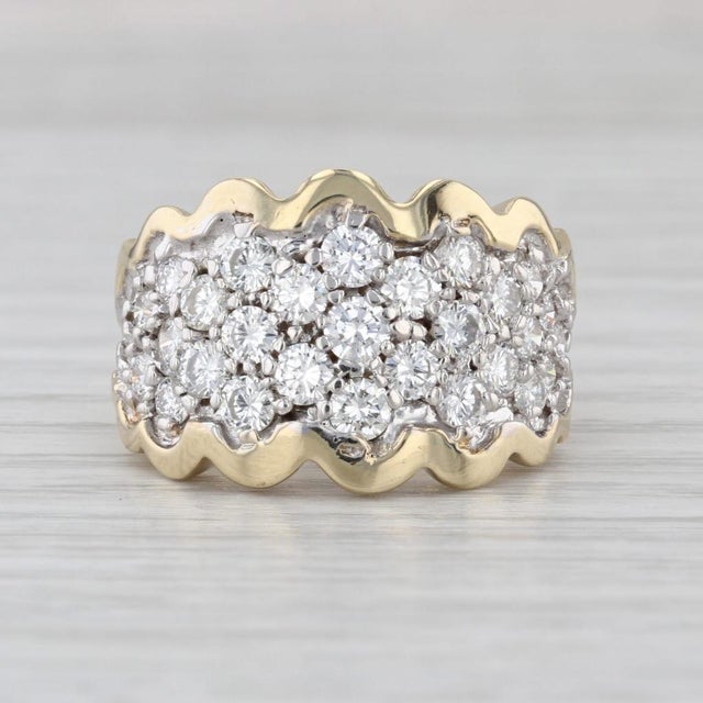 Gemstone Information: - Natural Diamonds - Total Carats - 1.48ctw Cut - Round Brilliant Color - F - G Clarity - VS2 Metal:...