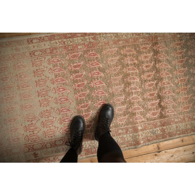 :: Covered field in boteh design elements arranged in staggered rows and columns with alternating direction. Colors and...