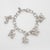 Stylish vintage Tiffany & Co dog themed charm bracelet crafted in sterling silver (circa 1980s). A hard to find and...