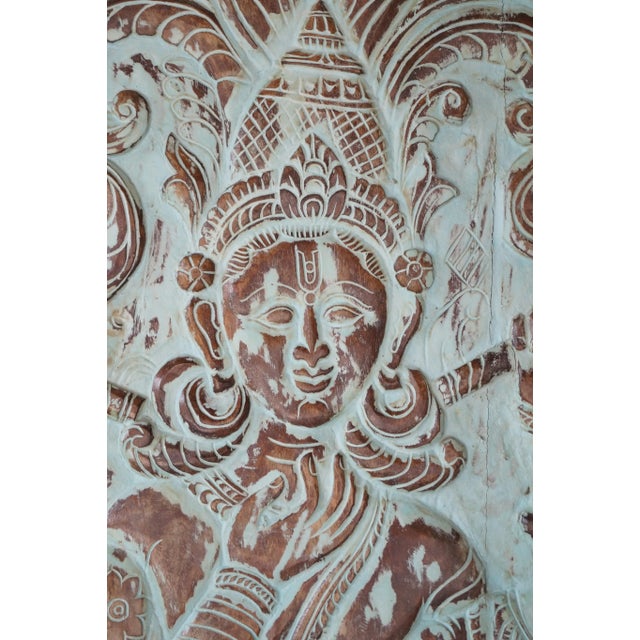 Celebrate artistry and spirituality with this vintage Krishna wall sculpture, handcrafted from reclaimed wood. Featuring...