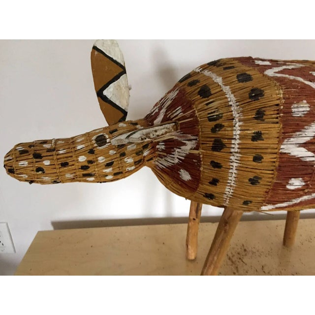 Aboriginal fiber art camp dog, known as Jamu. Artist: Yolanda Rostron. Year of birth: 1979. Nationality: Australian....