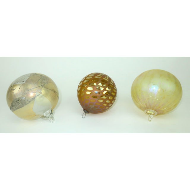 Deck the hall with artist made ornaments from two renowned art glass studios, Zweifel Art Glass in Idaho and Thames Glass...